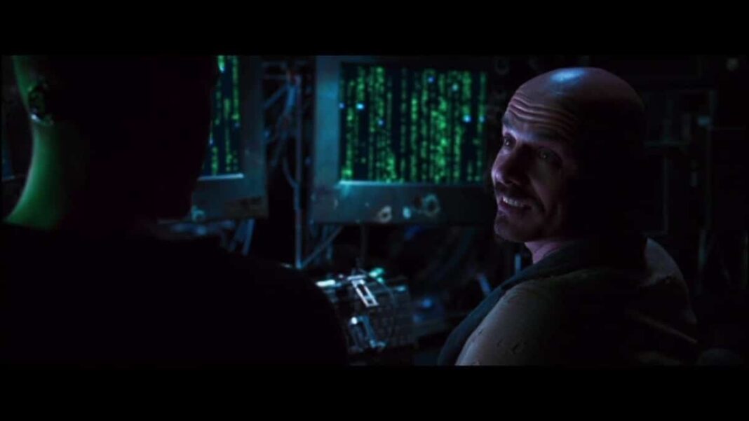 Keanu Reeves (Thomas Anderson) et Joe Pantoliano (Cypher) dans Matrix (1999).